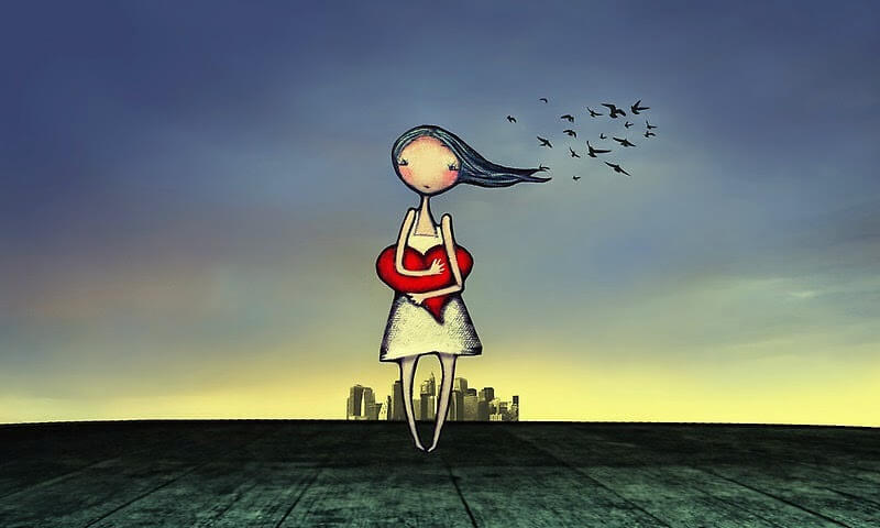 girl hugging heart