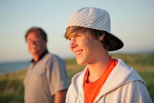 father with his son in the fields