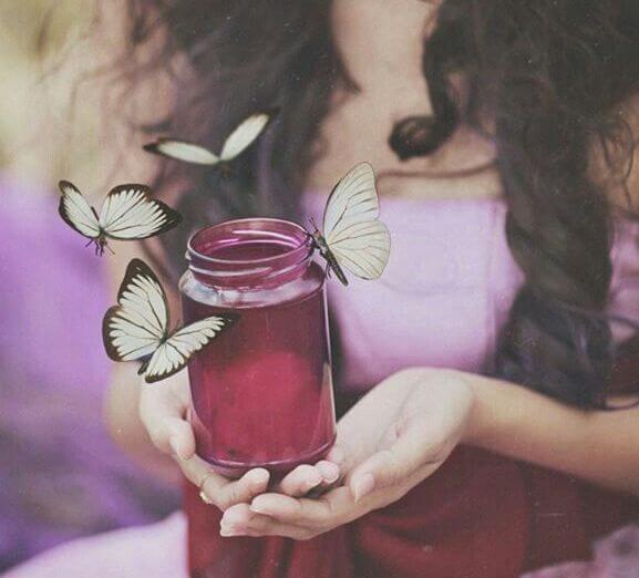 girl with jar and butterflies