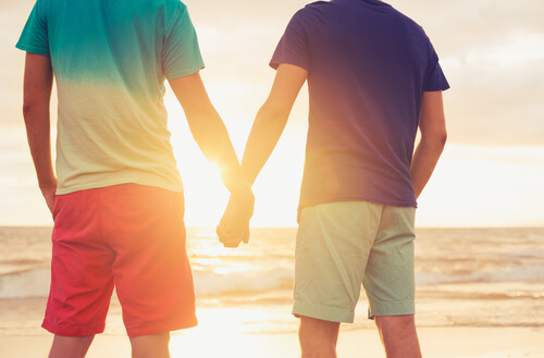 male couple holding hands