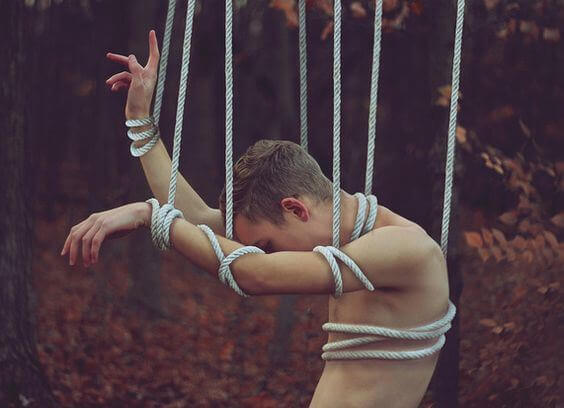 man tied with rope