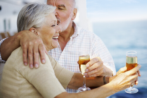 older people feeling young drinking champagne