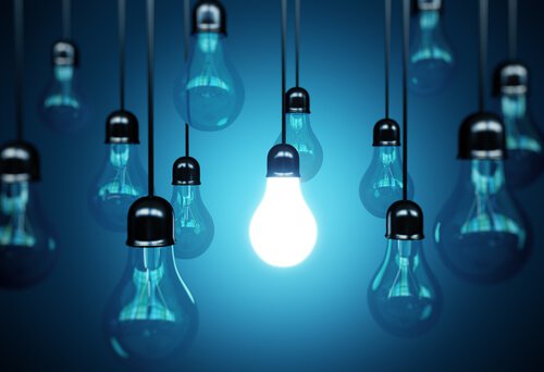 one lit lightbulb
