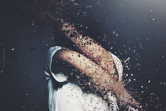 person breaking into tiny pieces