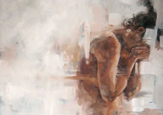 sad woman covering face