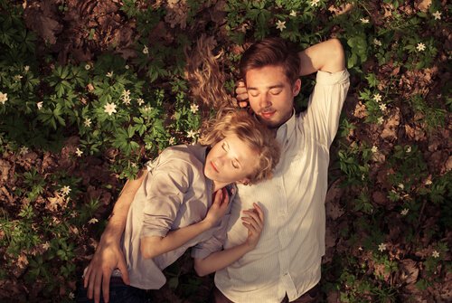 sleeping couple on grass