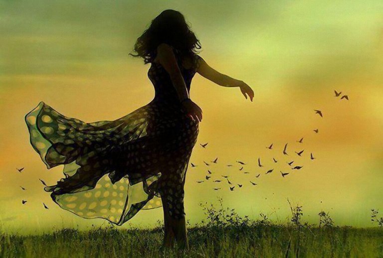 woman field flowing dress