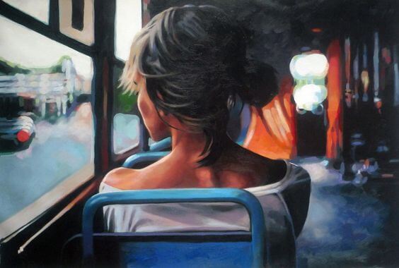 woman on bus looking out window