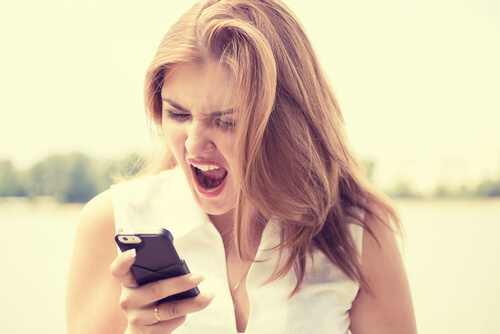 Woman Yelling at Cell Phone