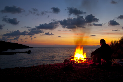 campfire by the water