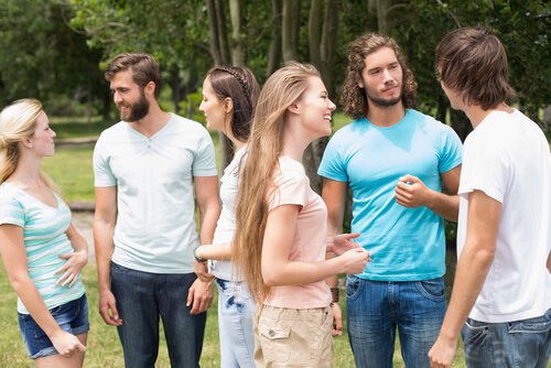 group of young adults conversing