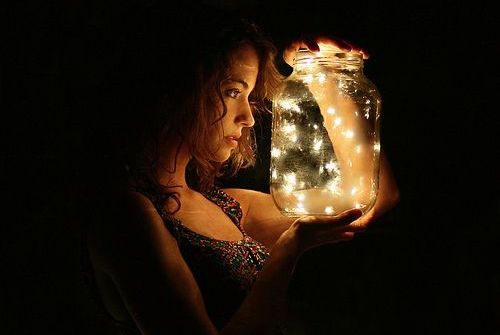 Woman with Jar of Fireflies