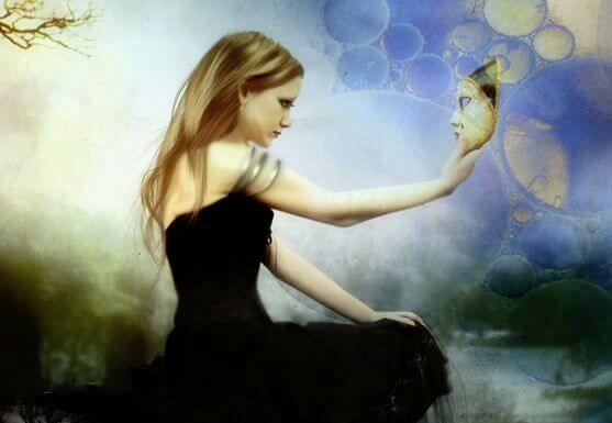 woman holding mask