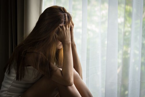 Sad Woman Staring Out Window