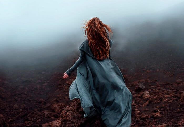 girl with blue dress running