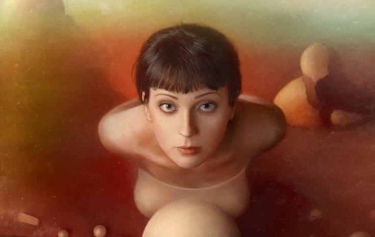 Woman in Front of Sphere