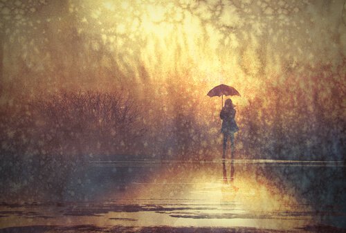 person alone in the rain