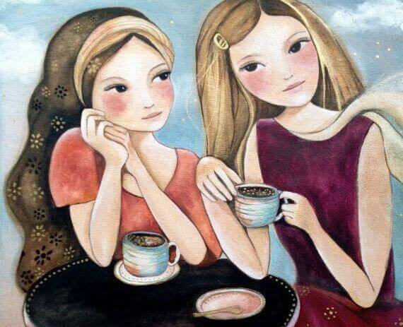 two girls drinking coffee