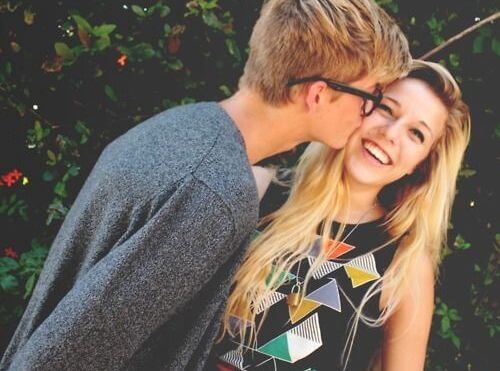 boy-kissing-girl-on-cheek