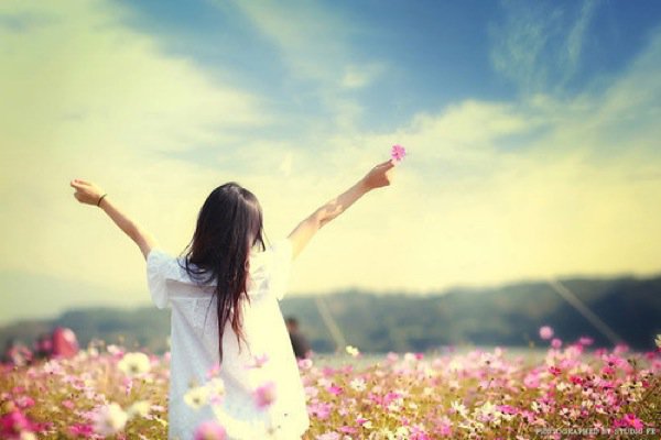 girl-among-pink-flowers
