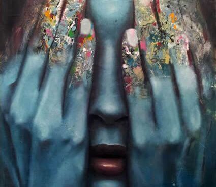 girl-covering-face-with-colorful-hands