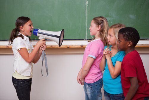 girl-with-megaphone-yelling-at-other-children