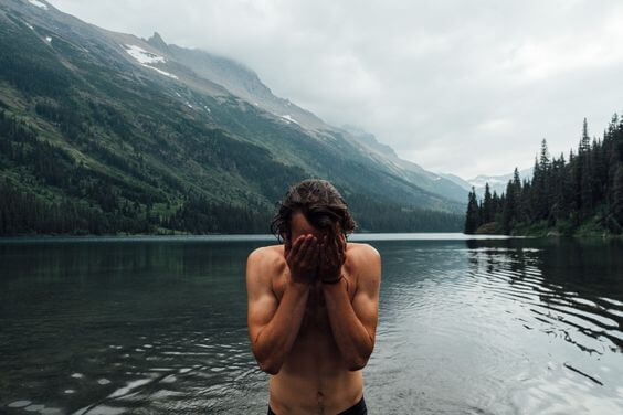 man at a lake