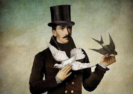 man-with-top-hate-and-two-birds