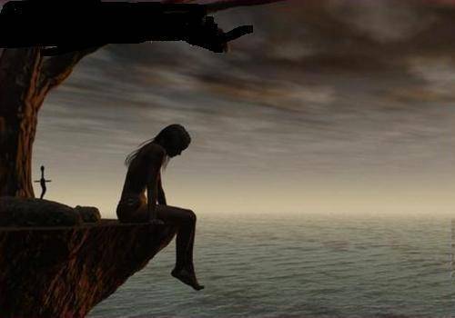 Silhouette Sitting on Cliff