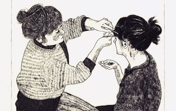 sisters combing hair