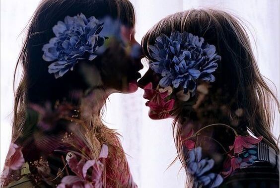 two-girls-embracing-flowers