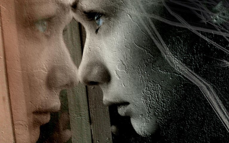 woman-looking-out-the-window-with-pain-768x480