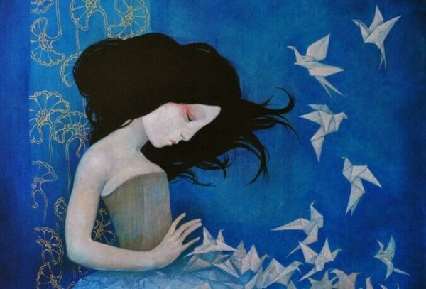 girl and paper cranes