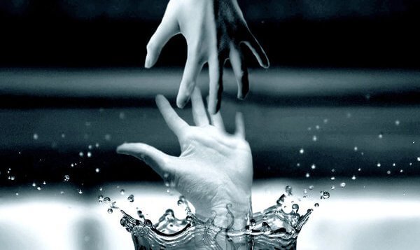 hands trying to grab each other