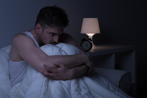 man awake at night