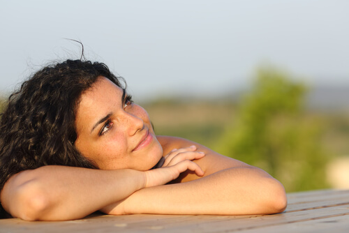 woman thinking hopefully