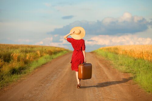 woman walking down country road