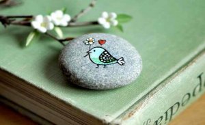 bird painted on a rock