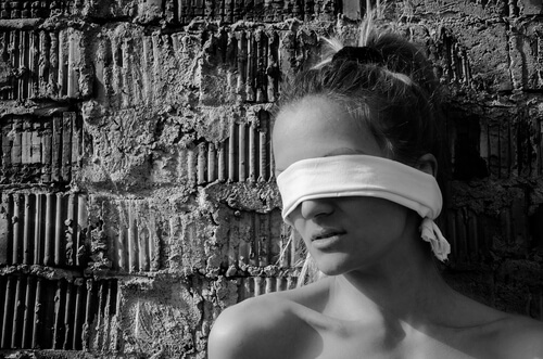 blindfolded woman