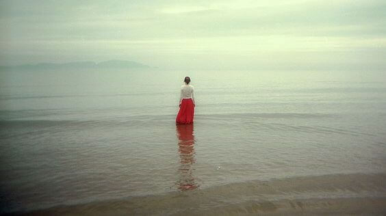 Woman Standing in Sea