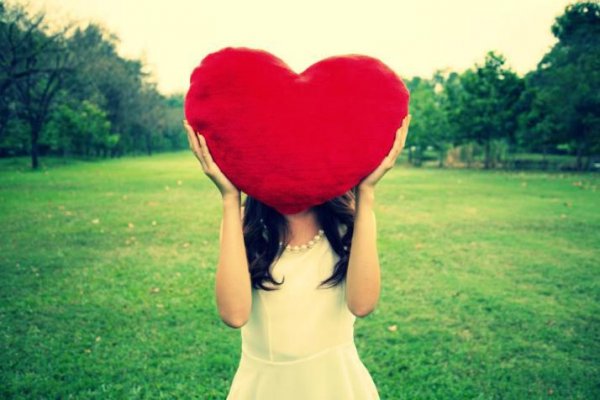 woman holding heart