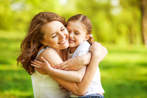 woman-hugging-her-daughter
