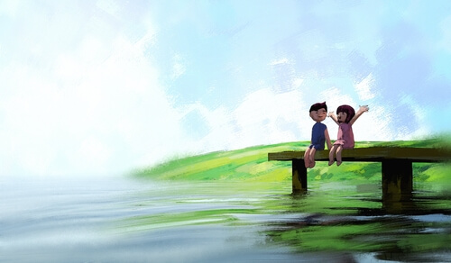 couple-sitting-on-a-dock-by-the-lake
