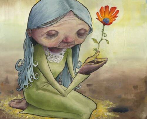 old woman holding flower
