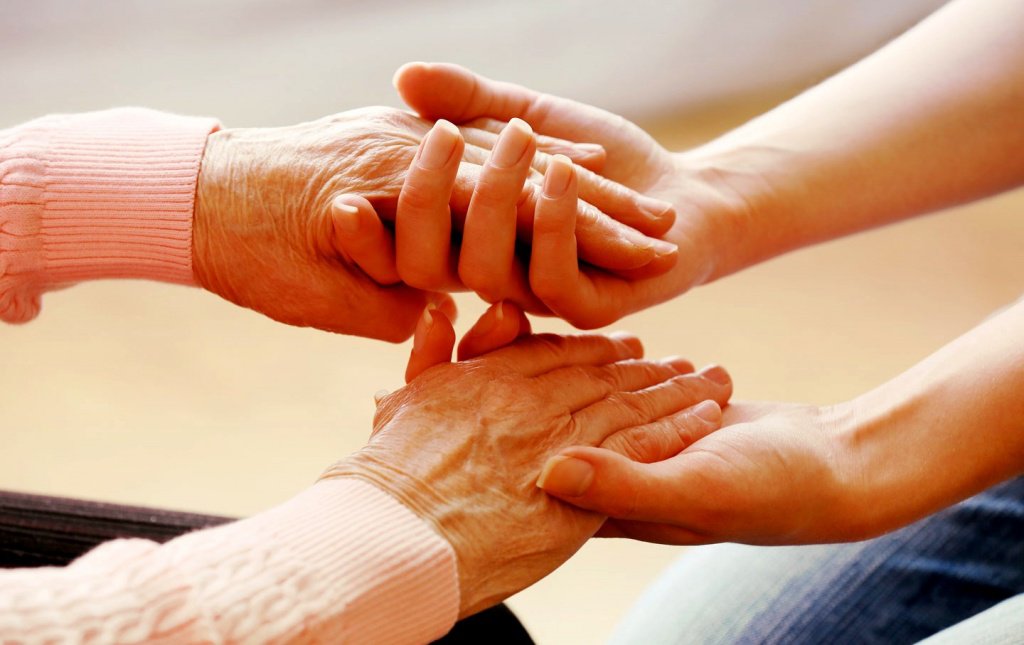 young-hands-holding-elderly-hands