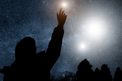 Man Touching Star