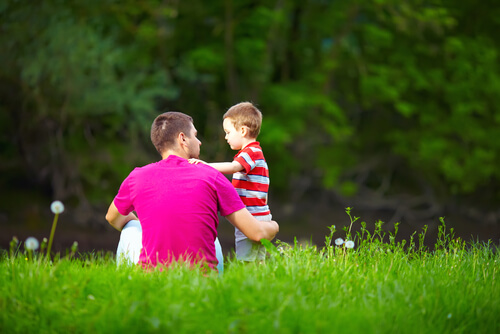 Son and Dad in Grass