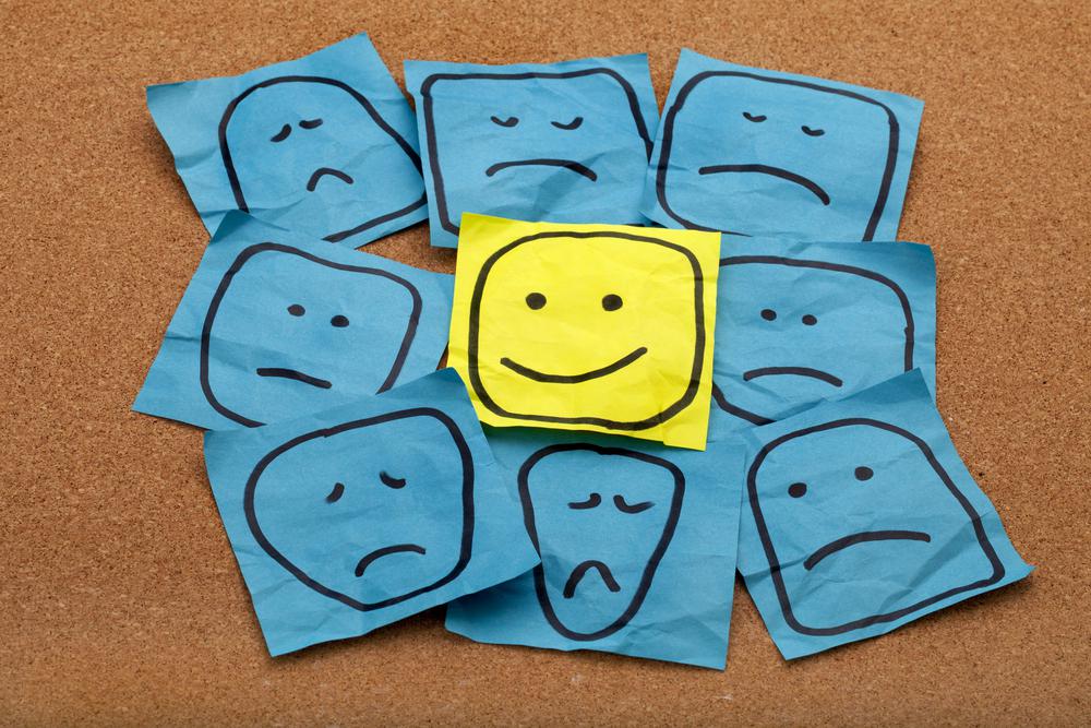 One Happy Face Among Sad Ones