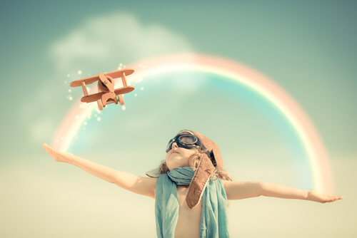 child airplane rainbow