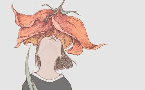 girl smelling flower